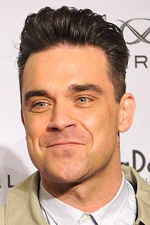 Les implants capillaires de Robbie Williams